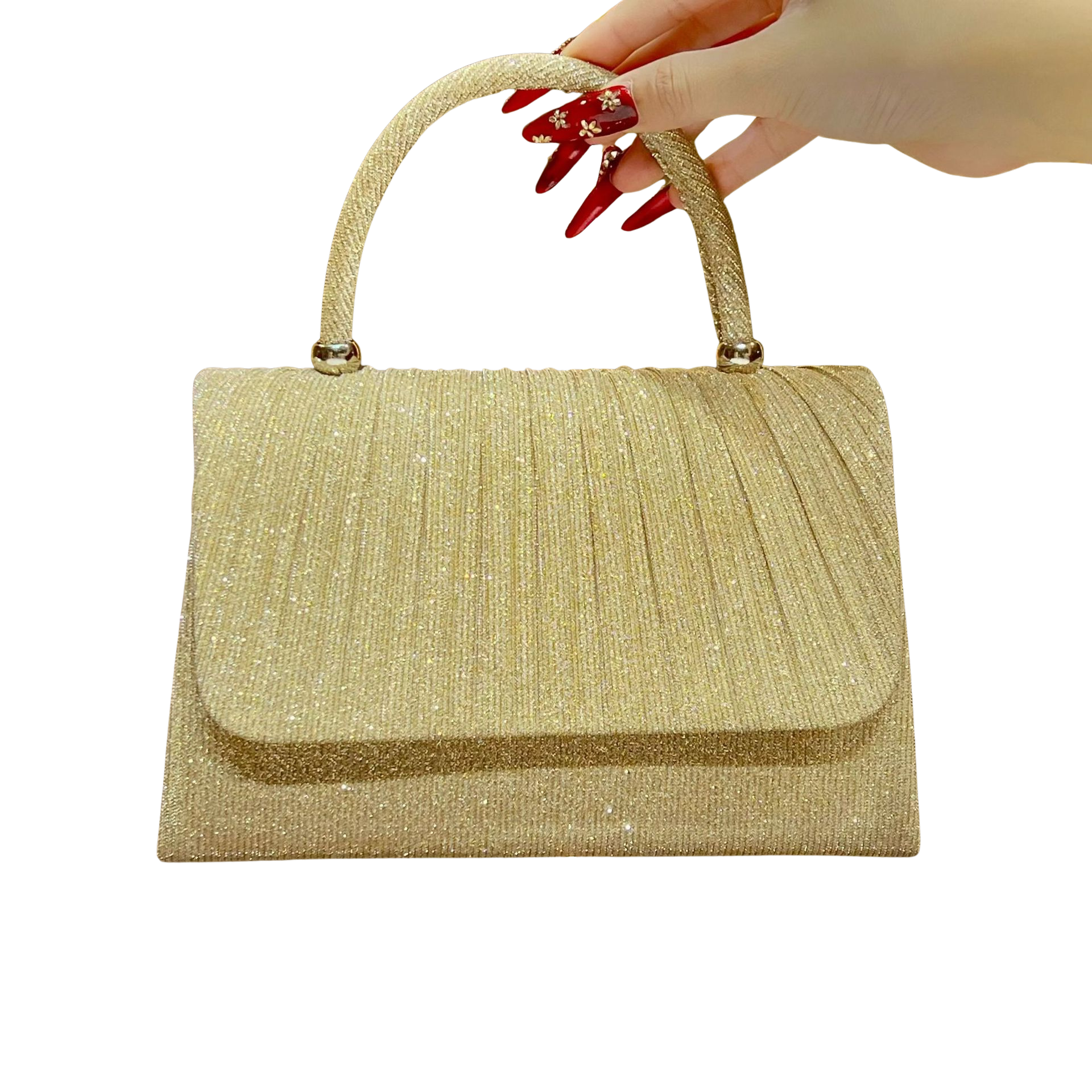 Gold handbag held by a hand with red nail polish on a white background