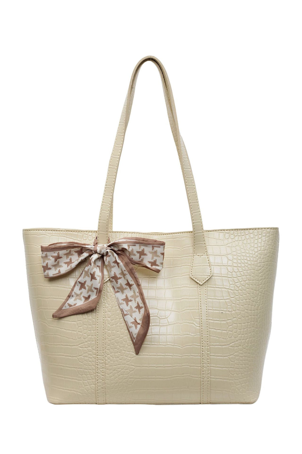 Beige handbag with a decorative bow on a white background
