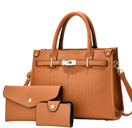 Brown crocodile-patterned handbag with matching wallet on a white background