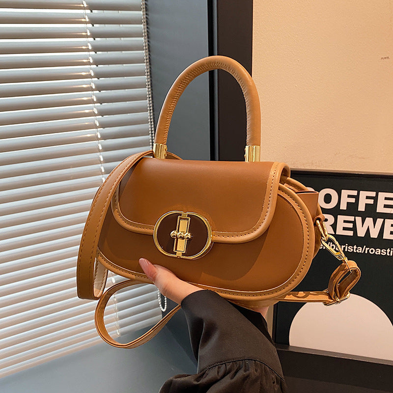 beige everyday shoulder bag for women in hand