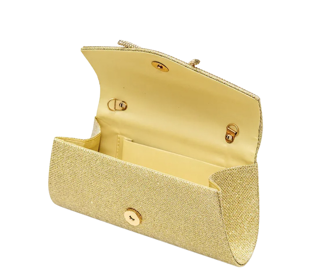 Gold clutch purse with open lid on a white background